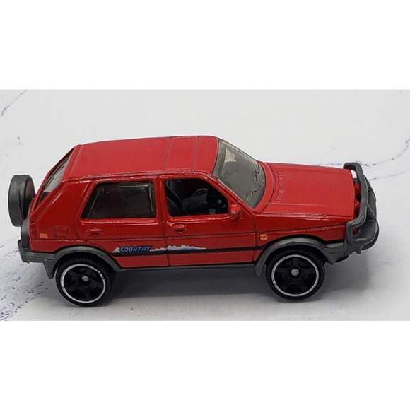 2018 Matchbox #99 MBX Road Trip '90 Volkswagen Golf Country Red - Picture 1 of 8